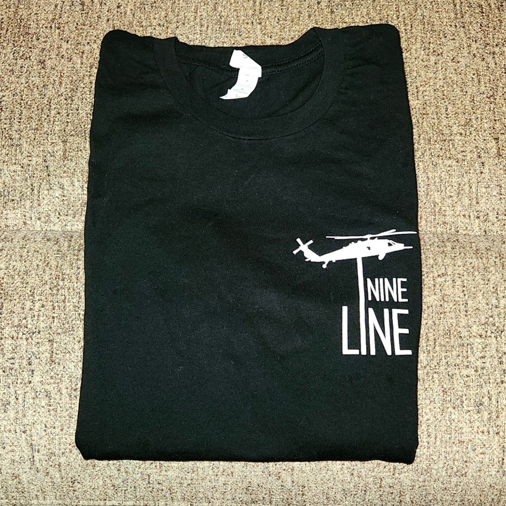 New woman's 9 Nine Line tee